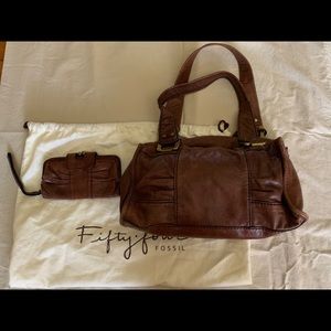 Fossil brown leather bag and wristlet.